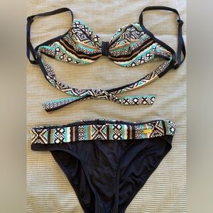 Venus swimsuit. Size 6 bottoms. Top varies in size- see photos